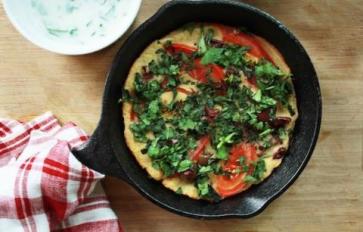 Vegan Recipe: Chickpea ‘Frittata’ With Tomatoes, Olives, & Kale